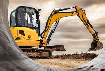 excavator machinery on construction site with cloudy sky showing digging action and earthmoving equipment 3 features 3 models 3 designs